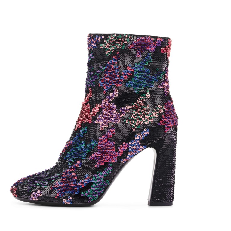 Ankle boots and tall boots with vibrant colours and meticulous details are in this season