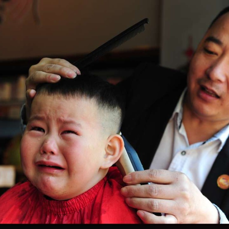 In pictures as ‘dragon raises its head’ Chinese get haircuts on lucky