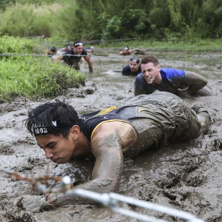 Aussie couple come back to conquer at Hong Kong Spartan Race – after using  last year's prize money to tie the knot