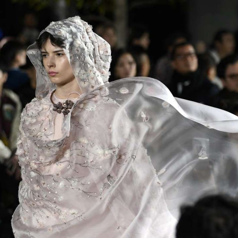 Christian Dior’s spring-summer 2017 haute couture collection by Italian designer Maria Grazia Chiuri on the rooftop garden of the Ginza Six new retail complex in Tokyo. Photo: EPA