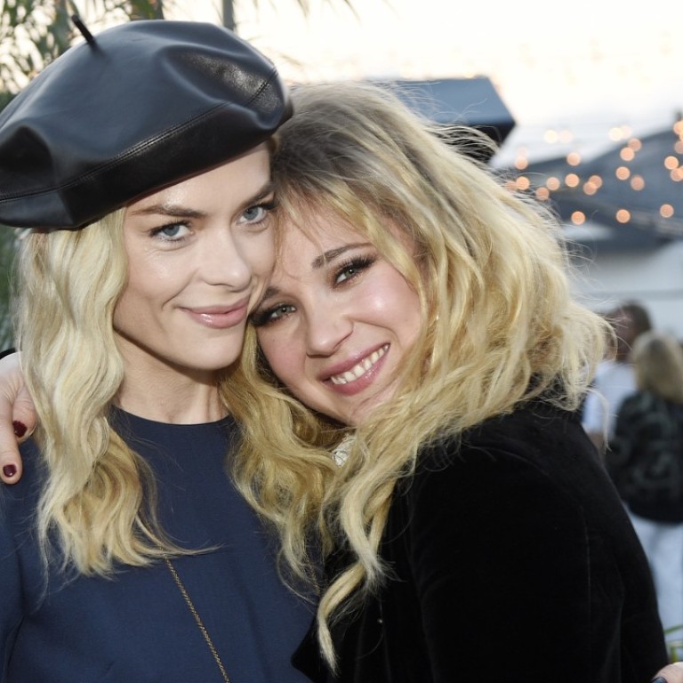 Actresses Jaime King, left, and Juno Temple pose together at the Dior Surf Club in Los Angeles. Photo: AP