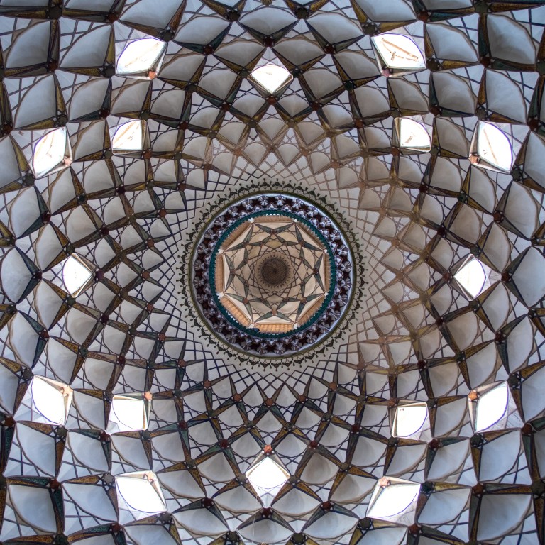 A beautifully adorned ceiling of the hall in Boroujerdi historical house, Isfahan Province, Kashan, Iran. Photo: Getty