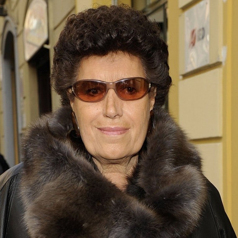 Carla Fendi arrives at her company fashion show in Milan in 2011. Carla Fendi, one of the five sisters who transformed the family leather goods business into a global luxury fashion house long known for its furs, has died following a long illness. Photo: AP