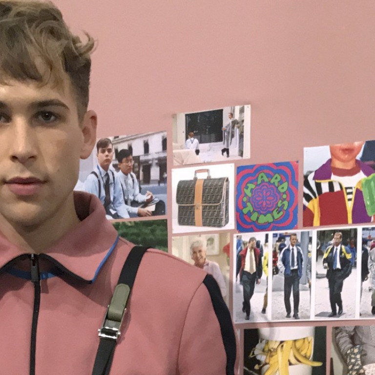 Tommy Dorfman poses for photos in the backstage of the Fendi men's Spring-Summer 2018 collection in Milan. Photo: AP