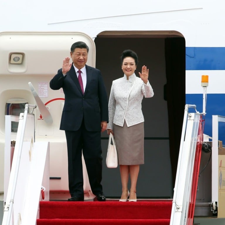 Chinese President Xi Jinping and his wife Peng Liyuan arriving at the Hong Kong International Airport. Photo: SCMP/ KY Cheng