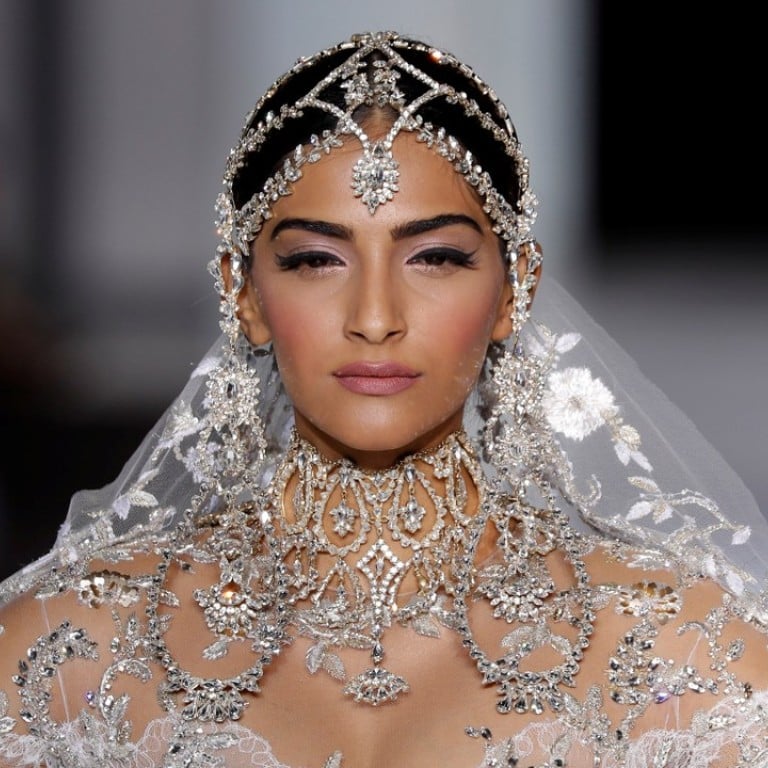 Sonam Kapoor presents a wedding dress by Ralph & Russo as part of their Haute Couture Fall/Winter 2017/2018 collection. Photo: REUTERS