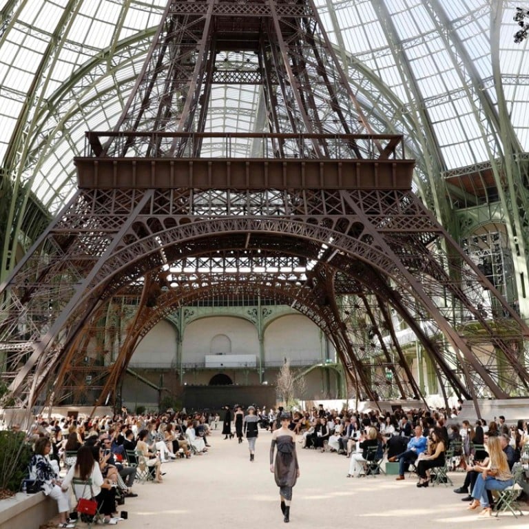 Models present creations for Chanel under a replica of the Eiffel Tower at the Grand Palais during the 2017-2018 fall/winter Haute Couture collection. Photo: AFP