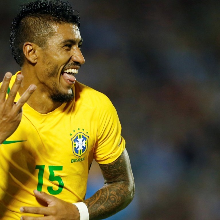 Guangzhou Evergrande's Paulinho set to join Barcelona, says