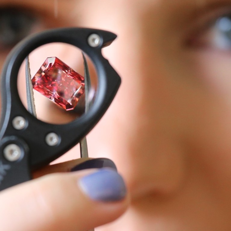 It looks like it glows rare 2.11 carat red diamond highly