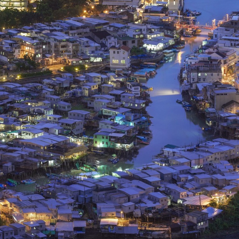 A twilight image of Tai O pictured by French photographer Romain Jacquet-Lagrèze.