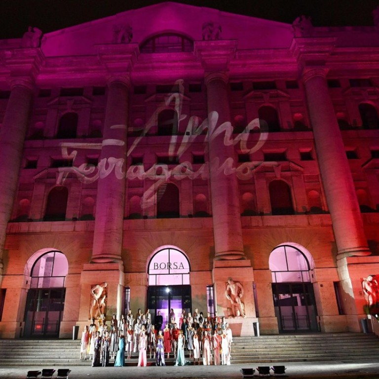 Models present creations by Salvatore Ferragamo at an outdoor show to celebrate the brand’s new ‘Amo Ferragamo’ fragrance during Milan Fashion Week. Photo: EPA