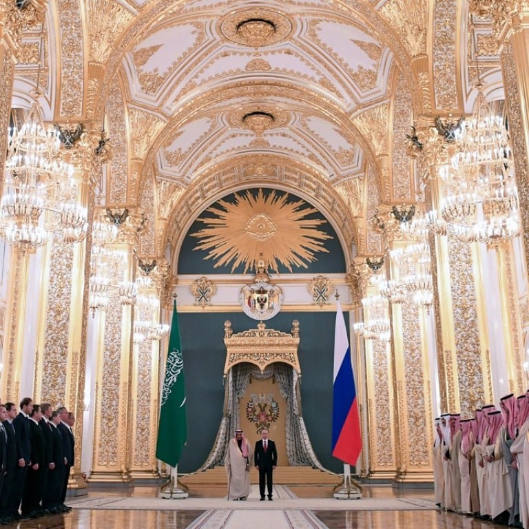 Russian President Vladimir Putin and Saudi King Salman bin Abdulaziz Al Saud (centre) attend a welcoming ceremony ahead of their talks at the Kremlin, Moscow. King Salman is on a three-day visit. Photo: EPA