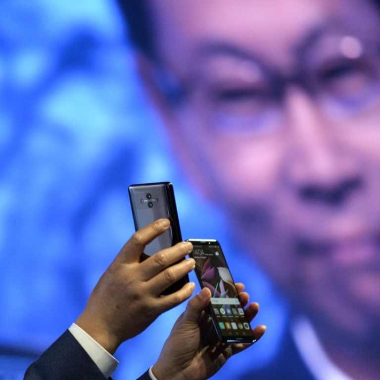 Richard Yu, chief executive of Huawei’s consumer business group, presents the new Huawei Mate 10 and Mate 10 Pro phones at the official launch event in Munich, southern Germany, on Monday. Photo: EPA