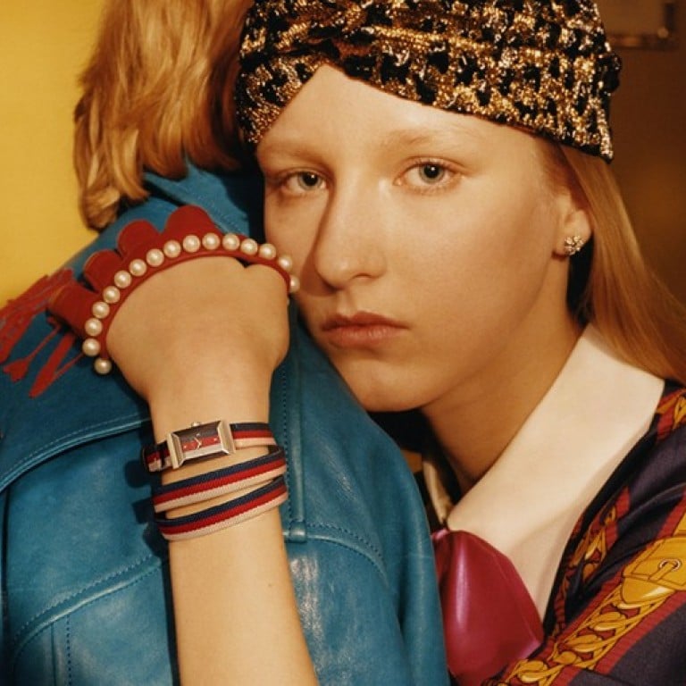 One model of Gucci’s G-Frame timepieces comes with multiple colourful nylon wraparound straps.