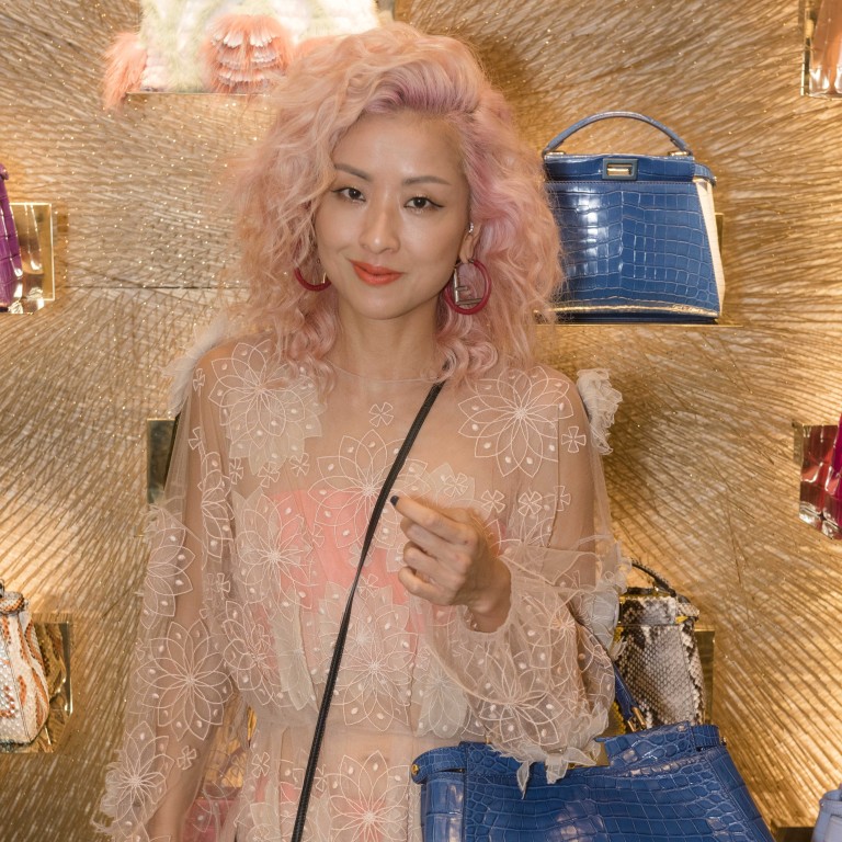 Yung chooses a phoenix pattern for her bag, while Tsai opts for a Venetian mask and a sparkly strap