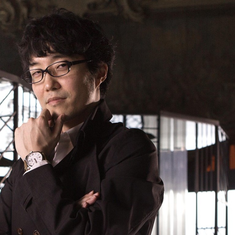 Oki Sato wearing the Panerai Radiomir 19403 Days Acciaio.