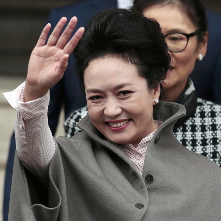 Peng Liyuan’s wardrobe choice steals the spotlight every time she makes a public appearance