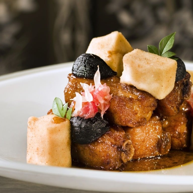 Braised pork ribs with preserved garlic in vintage vinegar and pomelo Sauce at Lai Heen, in the Ritz-Carlton, Macau.