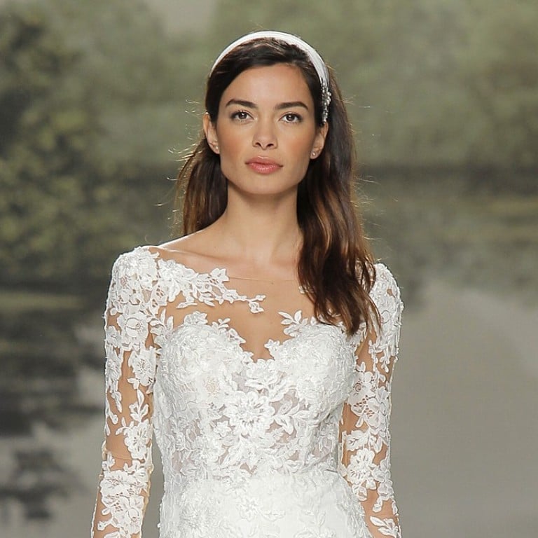 Studio St. Patrick uses lace in its long sleeved wedding gowns available at Hitched! Bridal.
