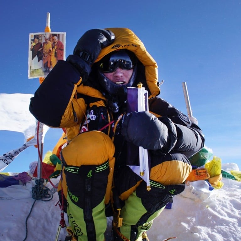 The moment that Elton Ng summit Everest. Ng, a physiotherapist, become the seventh Hong Kong people that has successfully scaled Mount Everest.