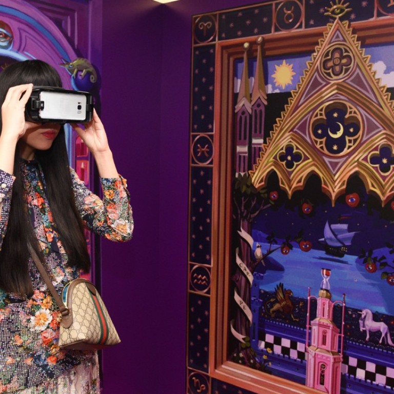 Susanna Lau tries out the VR experience at Gucci’s party in Hong Kong