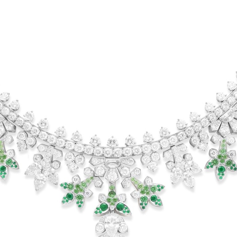 Van Cleef & Arpels. The Perce-Neige necklace, with a detachable clip, is in white gold and adorned with round, pear-shaped and half-moon diamonds, round emeralds and tsavorite garnets, including a 1.1ct pear-shaped diamond and a 1.1ct round diamond. Price on request