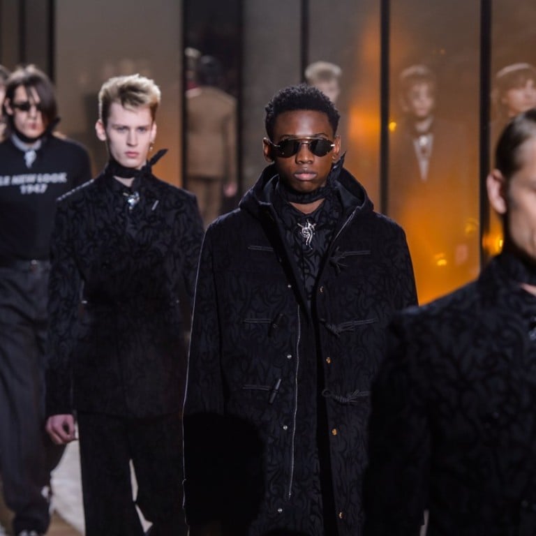 Dior Homme’s show featured heavy suits and reinterpreted Bar Jackets. Photo: EPA
