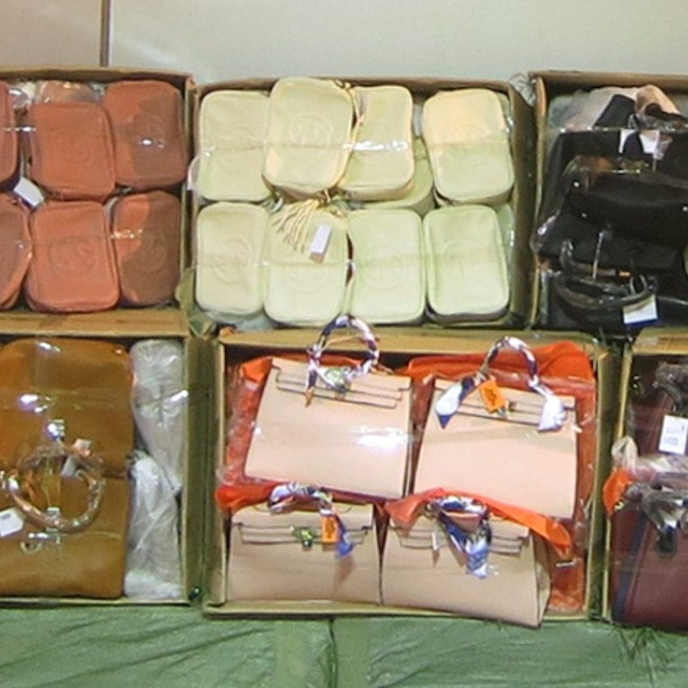 Haul of 6,000 fake designer handbags found in shipping container in