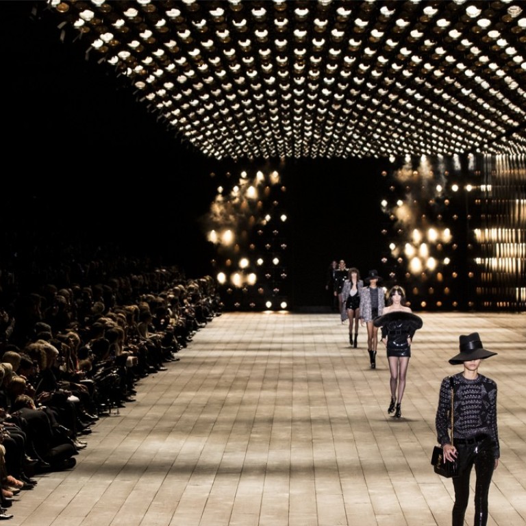Models present creations from the autumn/ winter 2018/2019 women’s ready to wear collection by Belgian designer Anthony Vaccarello for Yves Saint Laurent at Paris Fashion Week. Photo: Etienne LaurentT/EPA