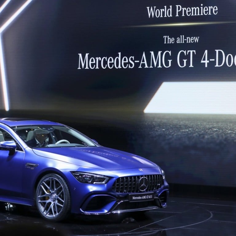 A Mercedes-AMG GT 4-Door coupe sits on display after its unveiling on the opening day of the 88th Geneva International Motor Show in Geneva, Switzerland. The show opens to the public on March 8, and will showcase the latest models from the world's top carmakers. Photographer: Chris Ratcliffe/Bloomberg