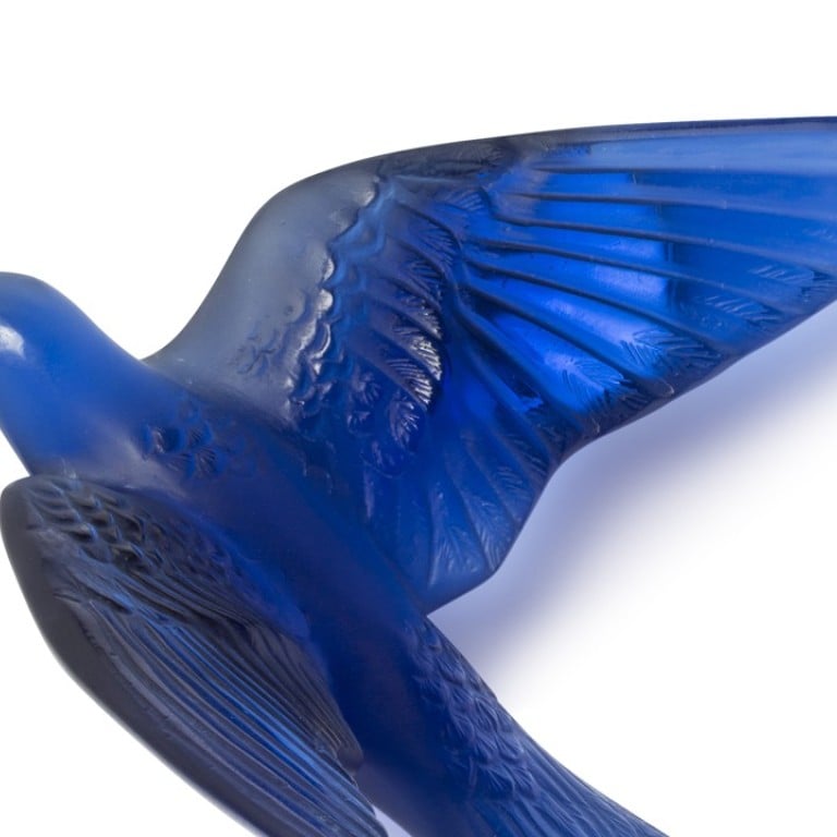 A swallow sculpture in Lalique’s Hirondelles collection