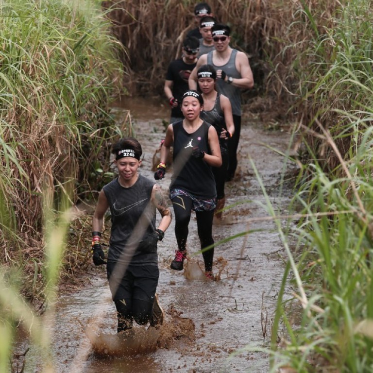 Aussie couple come back to conquer at Hong Kong Spartan Race – after using  last year's prize money to tie the knot