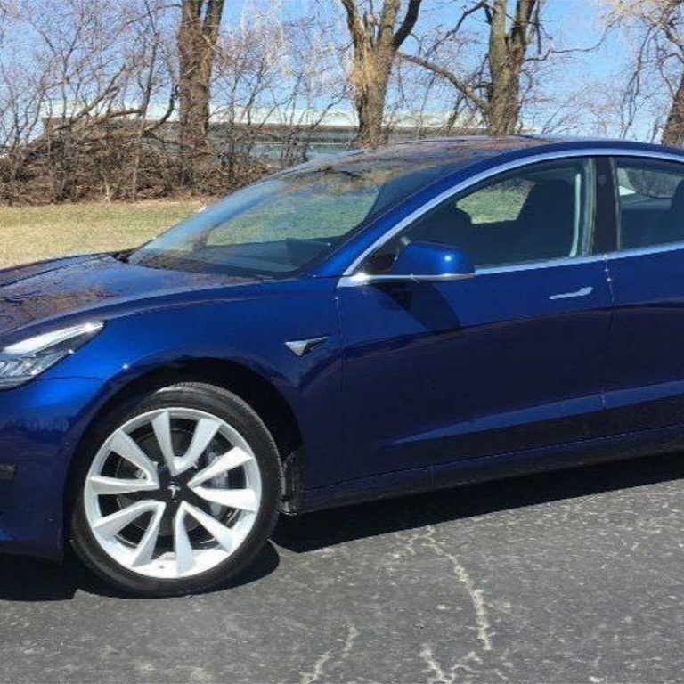 The Tesla Model 3 – in deep-blue metallic paint with 19-inch (48-centimetre) wheels – is the best ‘affordable’ electric vehicle on the market. Photo: Chicago Tribune