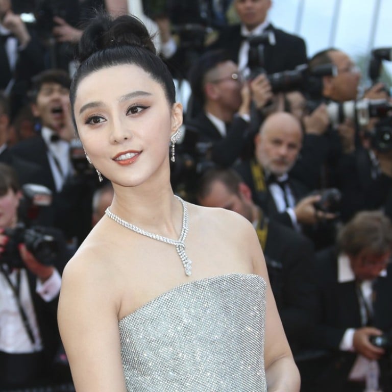 Chinese actress Fan Bingbing poses for photographers after arriving at the opening ceremony of the 71st Cannes Film Festival in France. Photo: AP