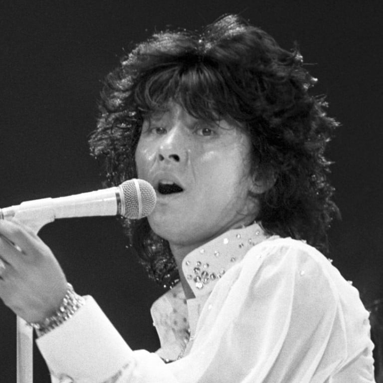 Japanese singer Hideki Saijo, pictured performing in 1979, who was best known for his cover version of the international hit Y.M.C.A., has died aged 63. Photo: Kyodo