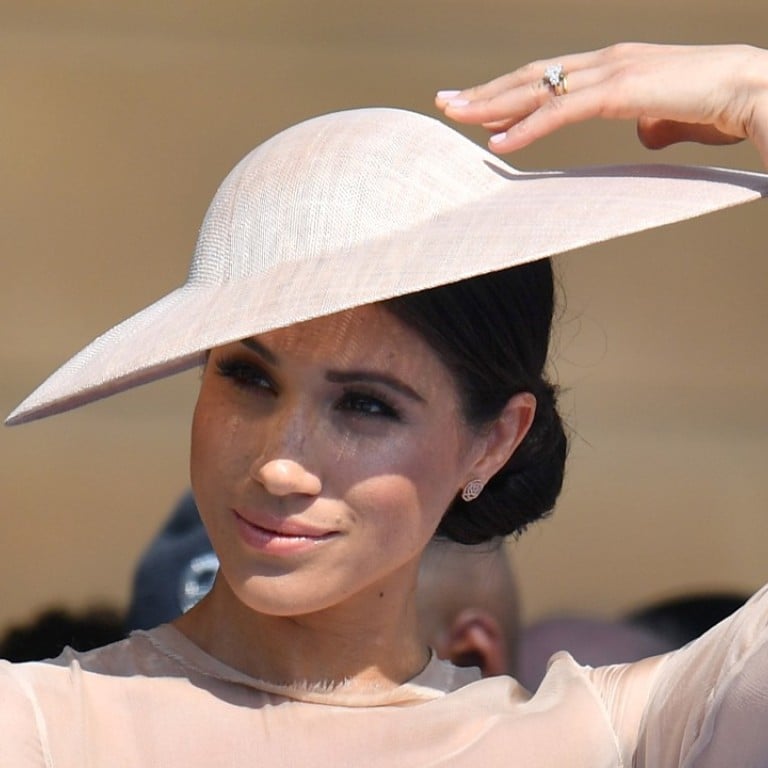 Meghan, Duchess of Sussex, attends a garden party at Buckingham Palace, in London, Britain May 22, 2018. Dominic Lipinski/Pool via Reuters
