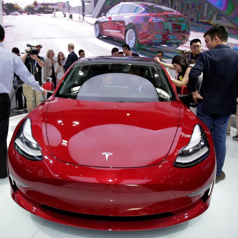 Tesla announces new China CFO: former General Motors exec James Zhou ...