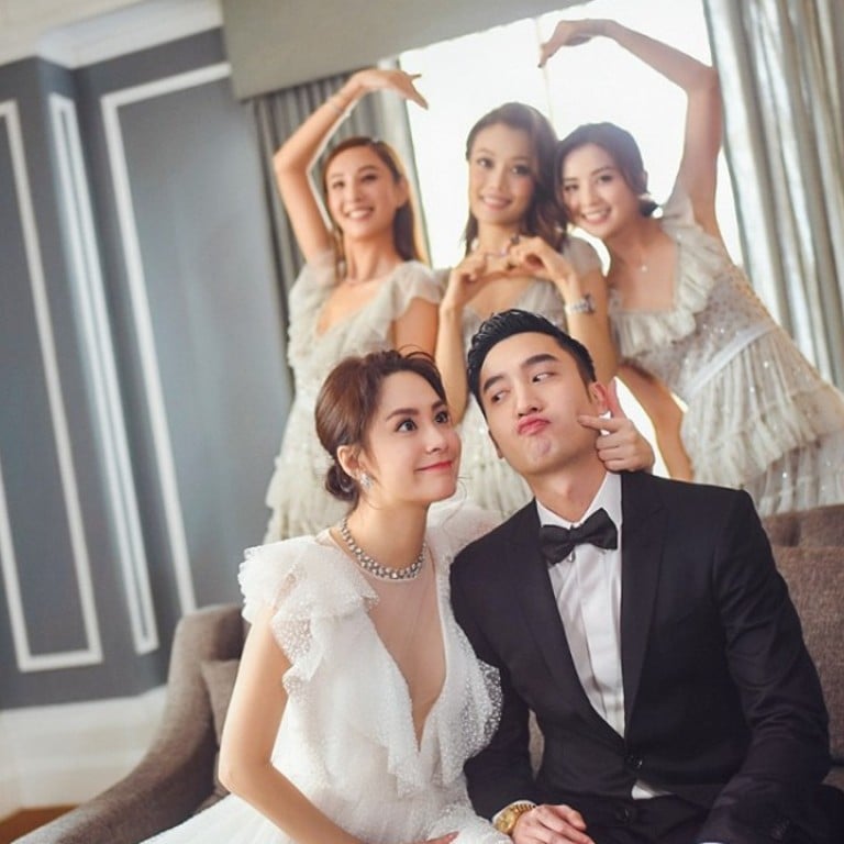 Hong Kong singer Gillian Chung and Taiwanese doctor Michael Lai (front) pose for a fun picture during the wedding celebration with their three bridesmaids (at the back, from left) Yumiko Cheng, Joey Yung and Charlene Choi.