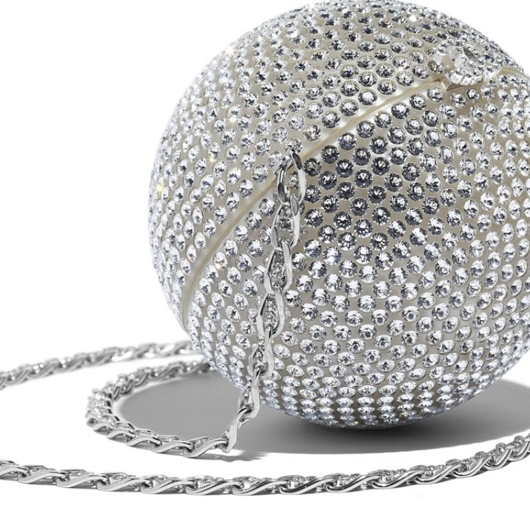 Chanel. Featuring a unique design, the silver minaudière in metal leather and strass is perfect for a night out, HK$115,900