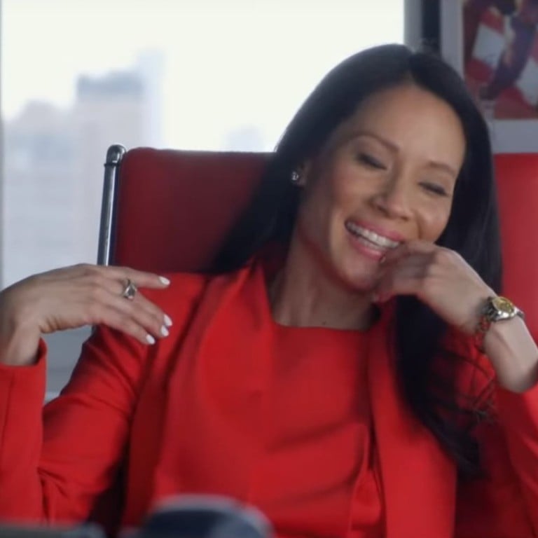 Lucy Liu – looking fabulous in red – as the no-nonsense boss Kirsten in the new Netflix film ‘Set It Up’.