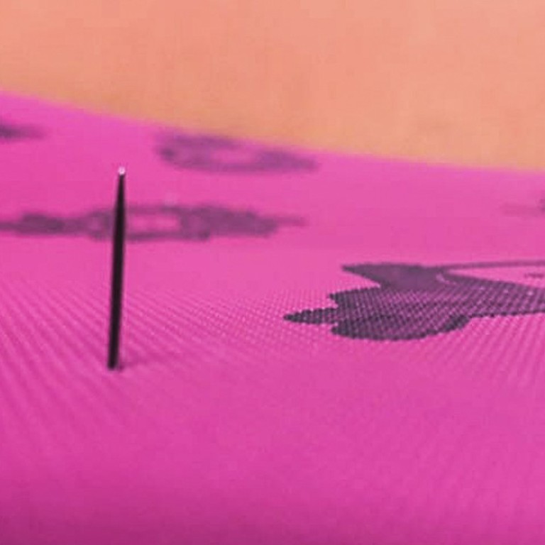 Needles sticking out of Hong Kong bus seats injure two passengers