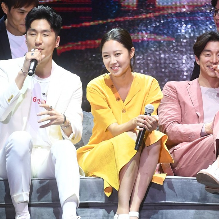 The South Korean heartthrob actor Gong Yoo (far right), who celebrated his 39th birthday on July 10, takes part in a ‘meet the fans’ event in Hong Kong.