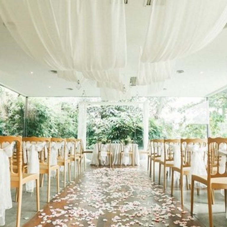 Air-conditioned Glass House at Ciao Ristorante. Photo by WeFreeze Photography via Weddings Malaysia