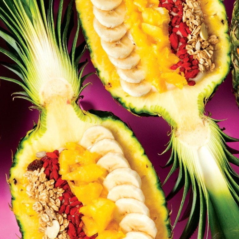 A Virgin Pineapple Piña Colada – one of two smoothie bowls, topped with toasted granola and other superfood treats – served at the new Flamingo Bloom kiosk in IFC Mall in Central.