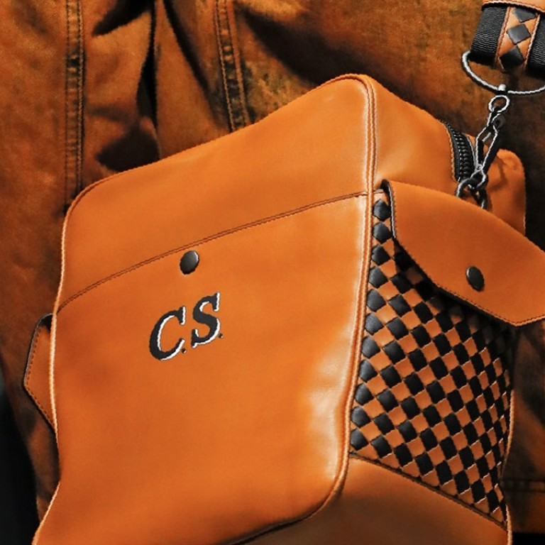 The Pilot 18 messenger bag in butter calf leather with Intrecciato checkers from Bottega Veneta’s autumn/winter men’s collection show