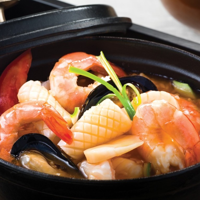 Poached seafood in superior prawn bisque with crispy rice, which features on the new menu created by chef Chung Kuy Fai at La Chine restaurant at The Parisian Macao.