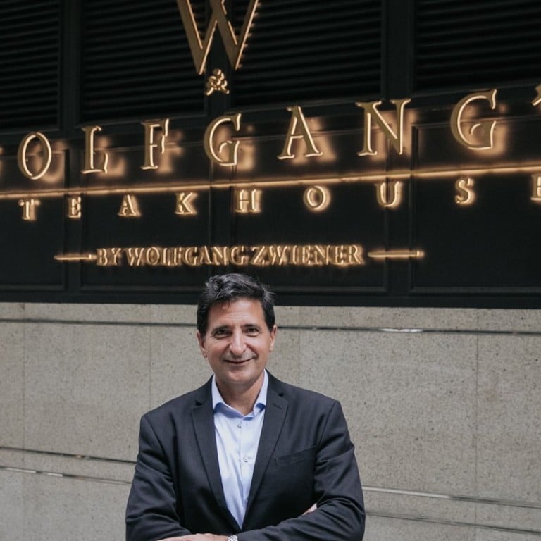 Peter Zweiner outside Wolfgang’s Steakhouse by Wolfgang & Zweiner in Central.