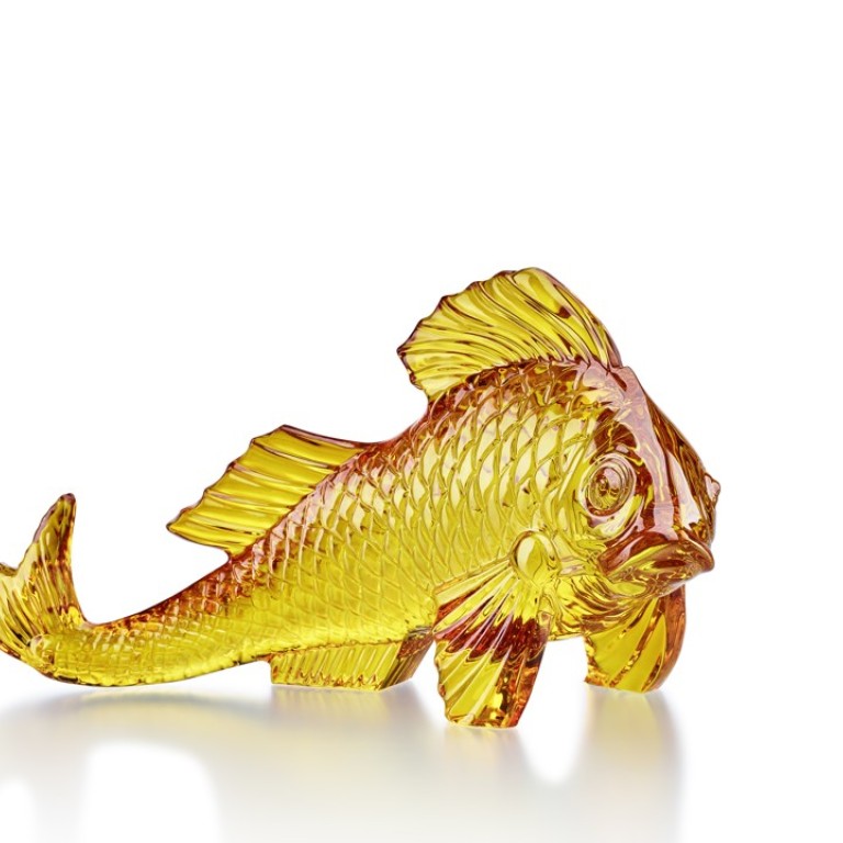 Baccarat. Inspired by Alexander Pushkin’s fairy tale, ‘Tale of the Fisherman and the Little Fish’, the amber crystal carp centrepiece is delicately cut to show the shimmering light of the gold fish. The fish also represents wealth in Chinese culture, HK$23,800