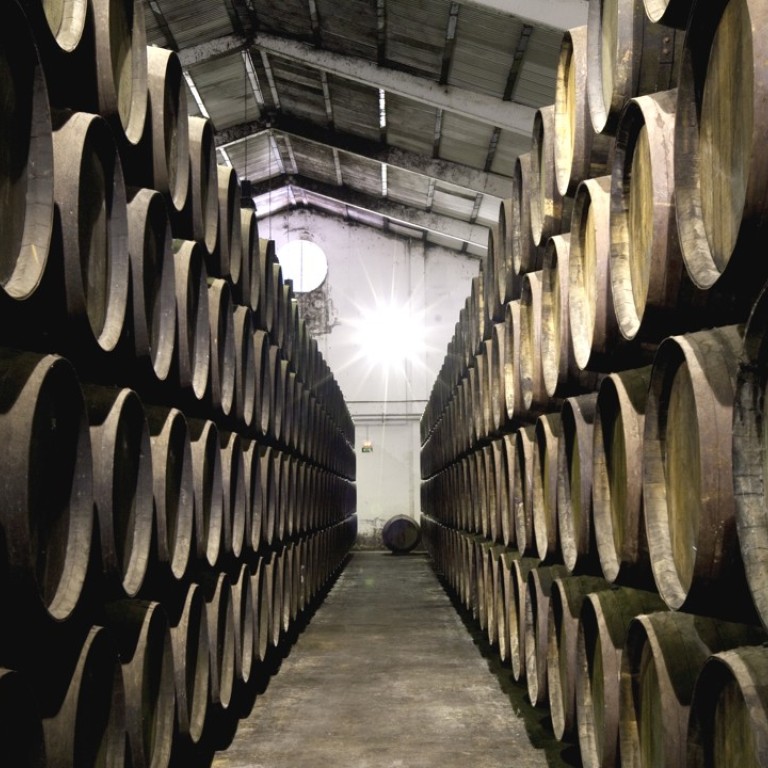 Wine barrels in the cellar at Delgado Zuleta, a bodega in southern Spain’s sherry-producing region. Five rare barrels that had been used for hundreds of years to age sherry have been sold.