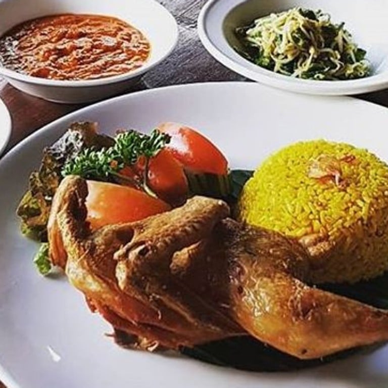 Bebek bengil – crispy duck, served with rice and vegetables – is a popular local dish served in warungs – local restaurants – on the island of Bali, Indonesia. Photo: Instagram @greedynomz.